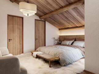 Experience rustic charm and modern comfort in this inviting bedroom.