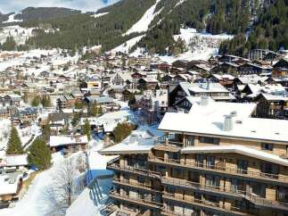Experience luxury mountain living in this stunning chalet-style property, nestled amidst the snow-capped peaks and evergreen forests of a picturesque ski resort.