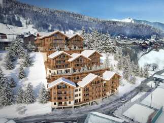 Experience luxury mountain living in this stunning chalet-style development, nestled amidst snow-covered slopes and evergreen forests.