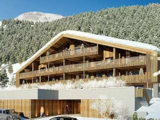 Experience luxury mountain living in this stunning architectural masterpiece, nestled against a backdrop of snow-covered pine forests and majestic peaks.