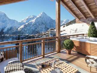 Experience luxury mountain living with this stunning chalet featuring a private hot tub and breathtaking panoramic views of snow-capped peaks.