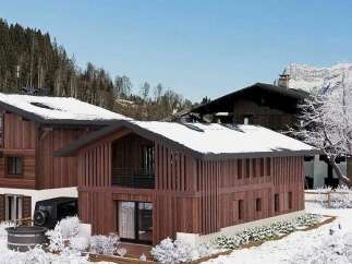 Experience luxury mountain living in this stunning wooden chalet, nestled amidst snow-covered landscapes and evergreen forests.