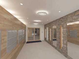 Discover modern living in this stylish apartment building hallway, featuring a warm wood-paneled wall adorned with sleek mailboxes.