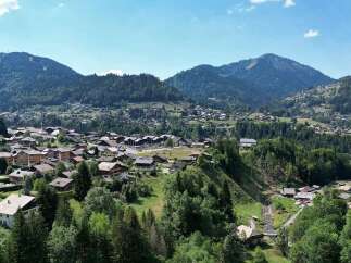 Nestled in a picturesque mountain village, this property offers a serene escape with breathtaking views of lush green slopes and charming architecture.