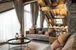 Experience luxurious mountain living in this stunning chalet-style living room.