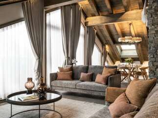 Experience luxurious mountain living in this stunning chalet-style living room.