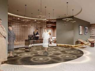 Experience ultimate relaxation in this luxurious spa lobby, featuring a modern reception desk and elegant seating areas.