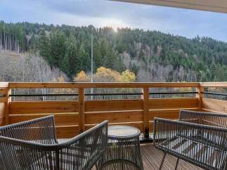Enjoy breathtaking mountain views from this charming balcony, perfect for morning coffee or evening relaxation.