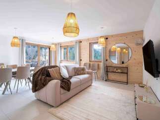 Experience modern living in this beautifully appointed living and dining area.