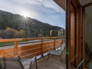 Enjoy breathtaking mountain views from this charming balcony, perfect for your morning coffee or evening relaxation.