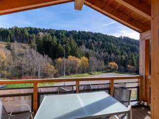 Enjoy breathtaking mountain views from this charming balcony, perfect for morning coffee or evening relaxation.