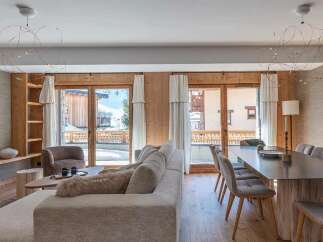 Experience luxurious mountain living in this stunning open-concept living and dining area.