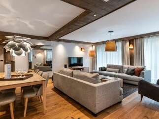 Experience luxurious mountain living in this beautifully appointed living and dining area.