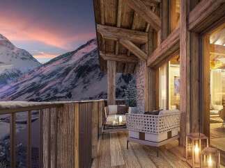 Experience the ultimate alpine retreat with this stunning mountain view balcony.