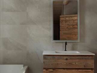 Experience rustic charm in this modern bathroom, featuring a floating wooden vanity with ample storage and a sleek white countertop.