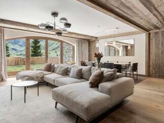 Experience luxurious mountain living in this stunning chalet-style living room.