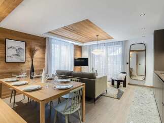 Experience modern alpine living in this beautifully appointed dining and living area.