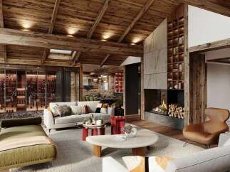 Experience luxury mountain living in this stunning chalet, featuring a grand living area with a roaring fireplace and exposed wooden beams.
