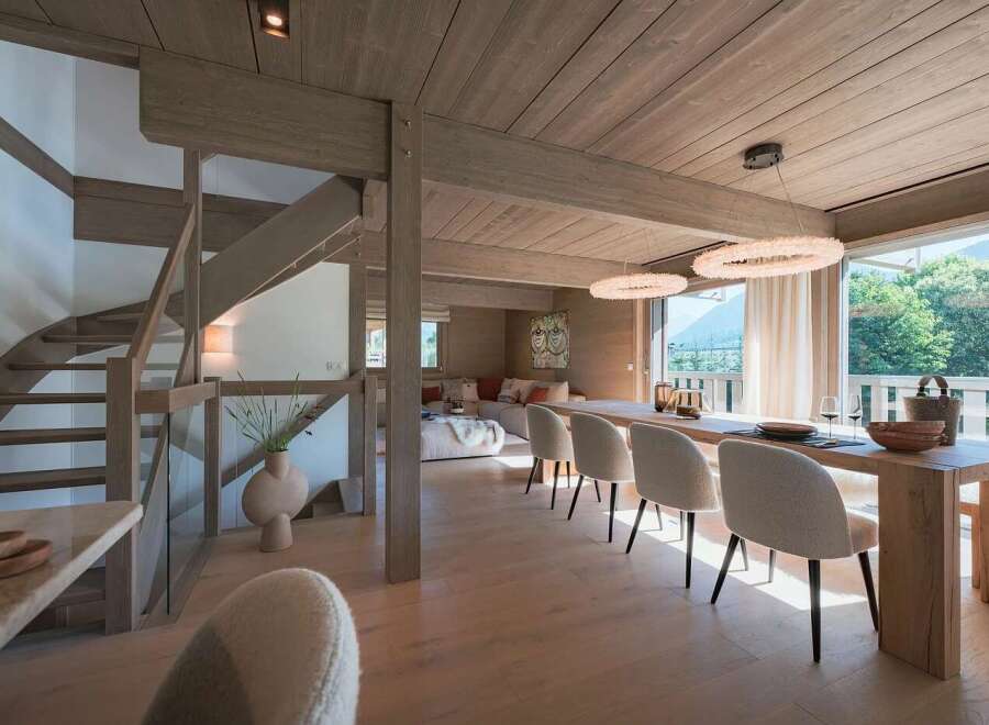 Experience luxury mountain living in this stunning open-concept dining and living area.