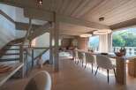 Experience luxury mountain living in this stunning open-concept dining and living area.
