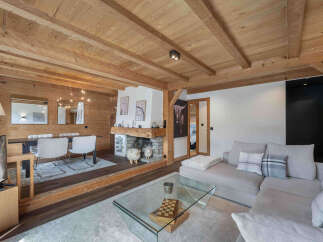Experience rustic charm and modern comfort in this stunning mountain retreat.