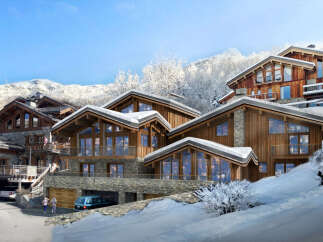 Experience luxury mountain living in this stunning chalet, nestled amidst snow-covered peaks.