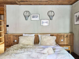 Experience rustic charm and cozy comfort in this mountain-inspired bedroom.