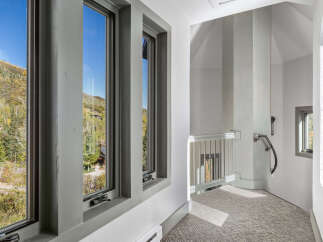 Experience breathtaking mountain views from the comfort of your home through expansive windows.