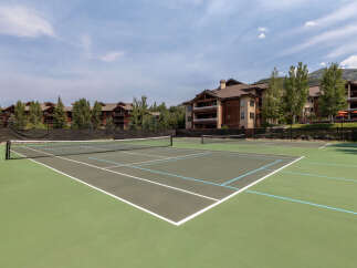 Enjoy a game of tennis on this beautifully maintained court, perfect for residents of the surrounding luxury condominiums.