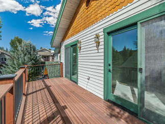 Enjoy the outdoors from this spacious deck, perfect for entertaining or relaxing.
