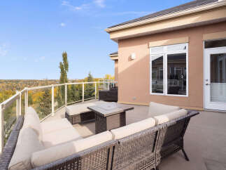 Enjoy breathtaking panoramic views from this expansive deck, perfect for entertaining or relaxing.