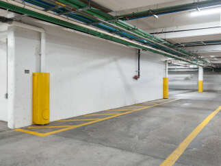 Discover the practical and organized spaces within this property's well-maintained parking garage.