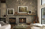 Experience rustic elegance in this stunning living room, featuring a grand stone fireplace as the centerpiece.