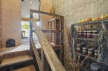 Discover a unique living space with rustic charm and modern functionality.