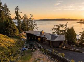 Experience breathtaking sunset views from this modern architectural masterpiece nestled on a secluded waterfront property.