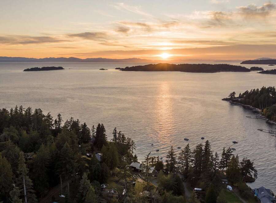Experience breathtaking sunset views over the tranquil waters from this stunning coastal property.