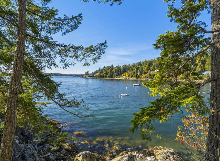 Experience serene waterfront living with this stunning property offering breathtaking ocean views and direct water access.