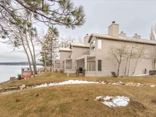 Experience lakeside living in this charming property featuring a private residence with stunning water views.
