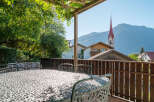 Enjoy breathtaking mountain views from this charming balcony, perfect for al fresco dining or morning coffee.