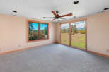 Experience breathtaking mountain views from this spacious room, featuring large windows that flood the space with natural light.