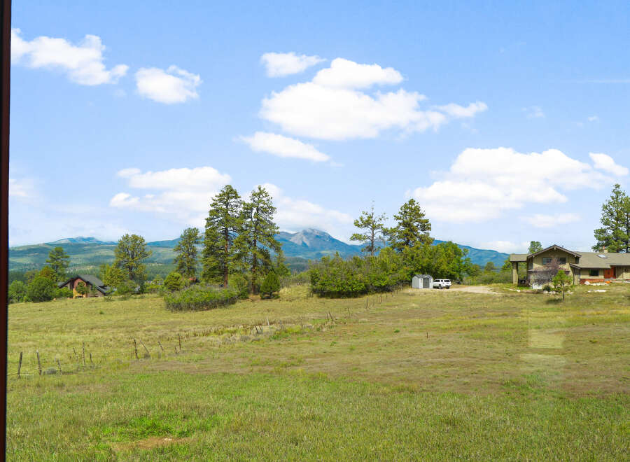 Discover your dream home nestled amidst breathtaking mountain views and lush green landscapes.