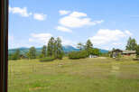 Discover your dream home nestled amidst breathtaking mountain views and lush green landscapes.