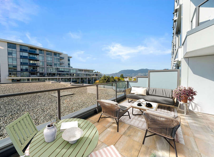 Enjoy breathtaking mountain and city views from this spacious balcony, perfect for entertaining or relaxing.