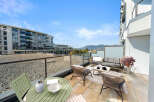 Enjoy breathtaking mountain and city views from this spacious balcony, perfect for entertaining or relaxing.