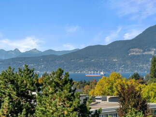 Experience breathtaking panoramic views of the majestic mountains and the sparkling blue water from this stunning property.