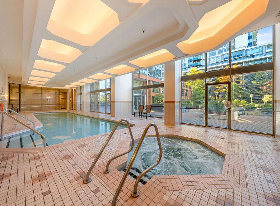 Indulge in relaxation with this indoor swimming pool and hot tub, perfect for year-round enjoyment.