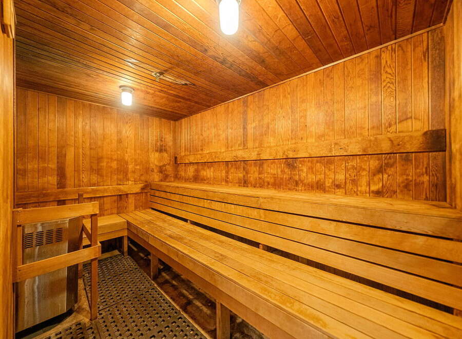 Experience ultimate relaxation in this beautifully crafted wooden sauna.