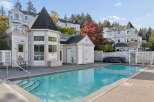 Enjoy resort-style living with this stunning swimming pool and clubhouse area, perfect for relaxation and entertainment.