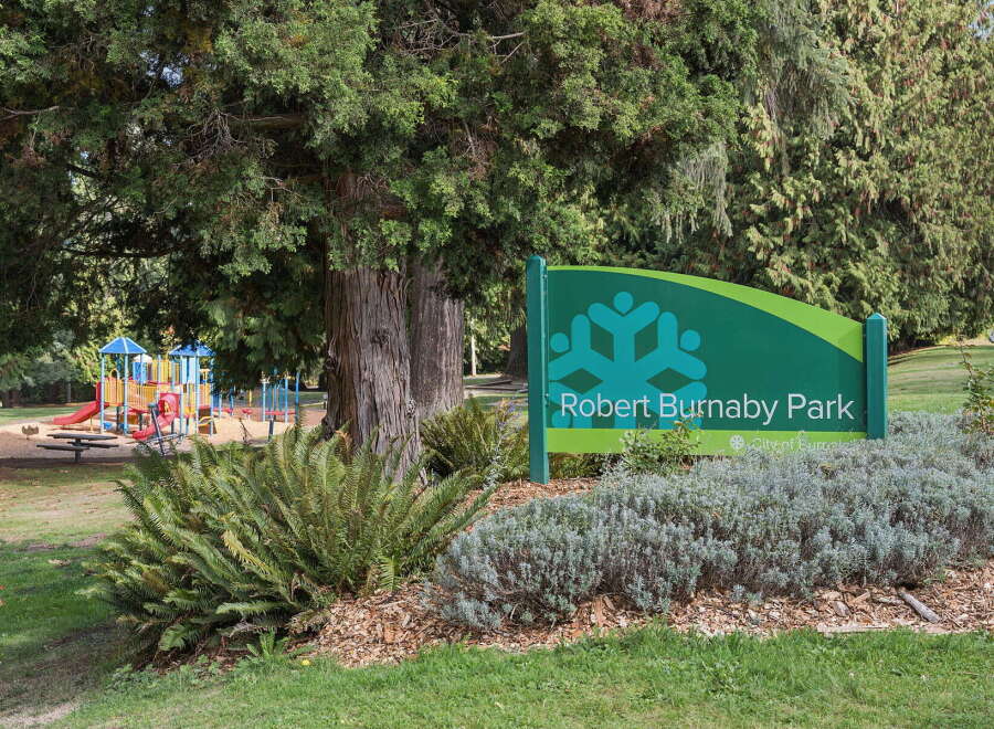 Discover the vibrant community of Robert Burnaby Park, featuring a colorful and engaging playground perfect for family fun.