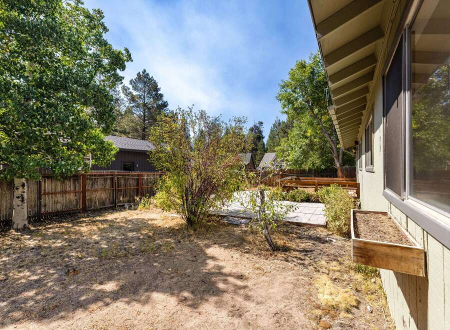 Discover this charming backyard, perfect for outdoor living and entertaining.